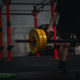 a person holding a barbell